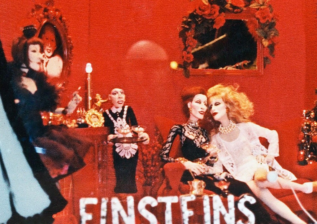 Einsteins Christmas window display featuring four of Greer Lankton's dolls.